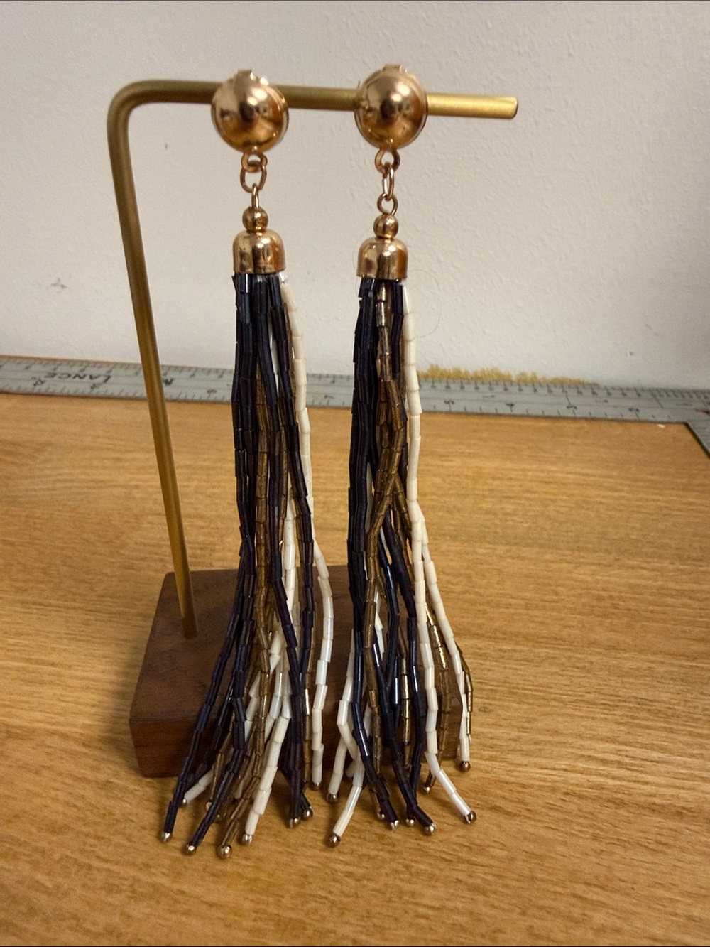 Long dangle beaded tassel statement earrings neutral tone gold tan black